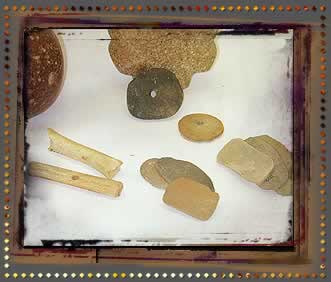 These game pieces were made from bone, to be hidden in the game of Peone! 